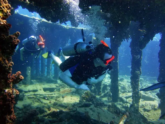 Divers check out an underwater wreck